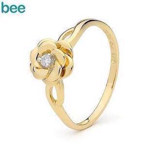 Blomster guldring med diamant knop