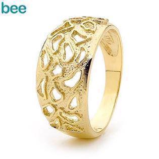 Bred 9 kt guld ring med m�nster