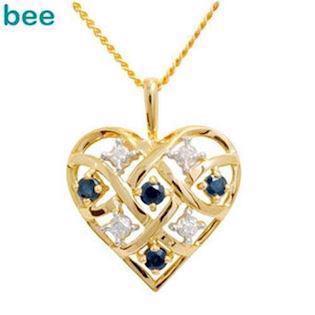 Guld hjerte vedh�ng med 4 x 0,005 ct diamant og 4 x safir