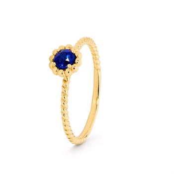 Romantisk guld mini blomster fingerring med blå zirkonia og kugle look fra Bee Jewelry