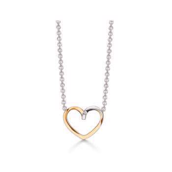 Støvring Design's smukke 14 karat guld vedhæng, to farvet hjerte med smuk 0,007 karat brilliant, leveres med rhodineret sølv kæde 42+3 cm