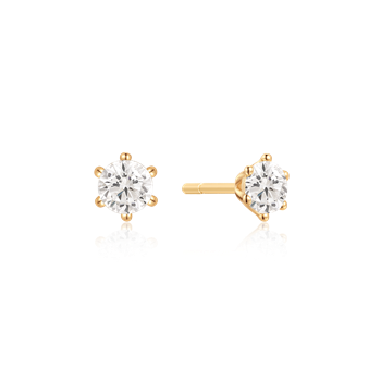 Guld ørestikker med runde, klare sten i prong-indstillinger fra Støvring Design.