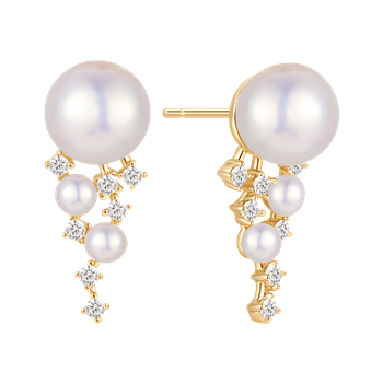 Sølvforgyldte ørestikker med store perler, klare sten under, i gylden nuance fra Støvring Design.