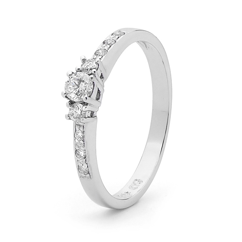 Engagement Ring 1/4ct Diamond JenStunning Diamond set engagement ring from 9 carat white gold and set with 9 Diamonds in bridge style formation. size P. Matching Ring - x