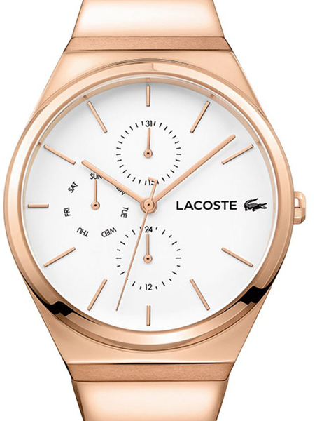 Rund hvid urskive med rosaguld detaljer, subdials og Lacoste logo, rosaguld urkasse og rem.