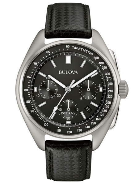 Sort urskive, tre underurskiver, tachymeter på bezel, "262 kHz" skrevet på skiven, sort rem.