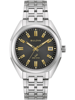 Bulova ur med stållænke, mørk skive, guldtoner, dato kl. 3, "262 kHz" angivet.
