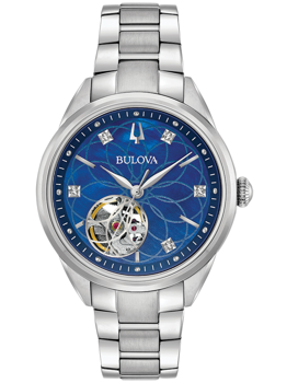 Bulova dameur med åbent hjerte, blå urskive med krystalmarkører og metalarmbånd.