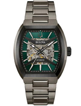 Bulova herreur med grøn urskive, synligt mekanisk urværk, rektangulær urkasse og metalarmbånd.