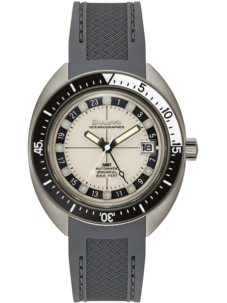 Bulova ur med beige urskive, sort krans, dato ved kl. 3, grå rem og tekst "Oceanographer".