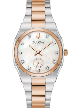 Bulova dameur med tofarvet rem, diamantmarkører på urskiven og sub-dial ved klokken 6.