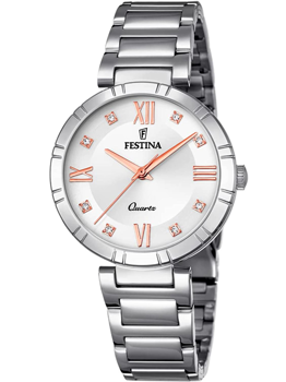 Festina dameur med sølvrem, roseguld romertal, små sten ved timerne, teksten "Festina" og "Quartz".