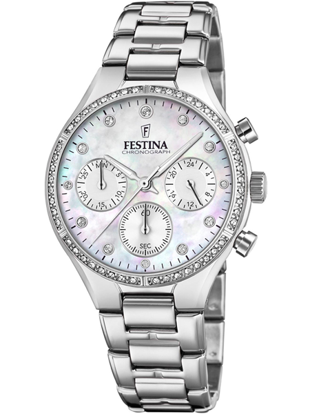 Rund urskive med tre subdials, datoindikator, stendekoreret bezel og skinnende metalarmbånd.