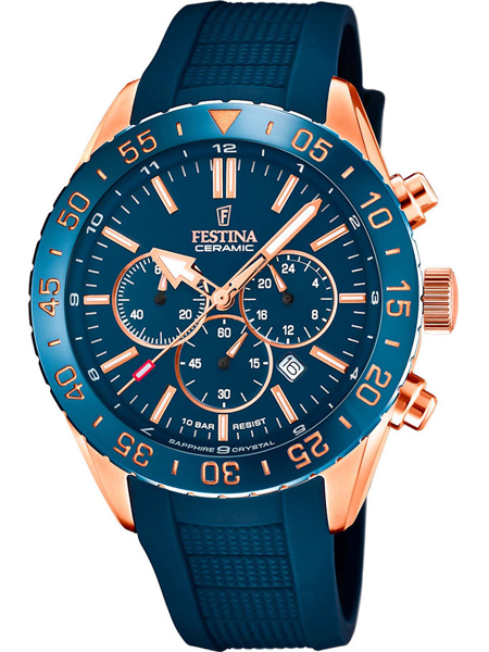 Blåt Festina ur med rosagulddetaljer, tre subdials, keramisk bezel, datovisning mellem kl. 4 og 5.