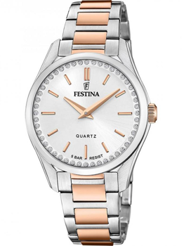Rund urskive med krystaller, guld- og sølvrem. Tekst: "FESTINA," "QUARTZ," "5 BAR RESIST."