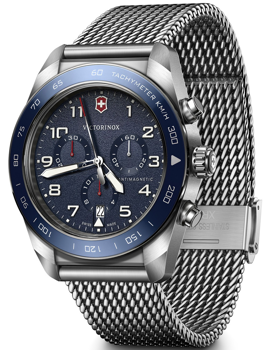 Victorinox herreur med blå urskive, tachymeter-bezel og metal mesh-armbånd.