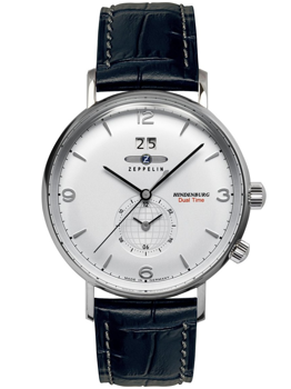 Rund urskive med subdial, datovisning, tekst "Hindenburg Dual Time", mørk læderrem med sømme.