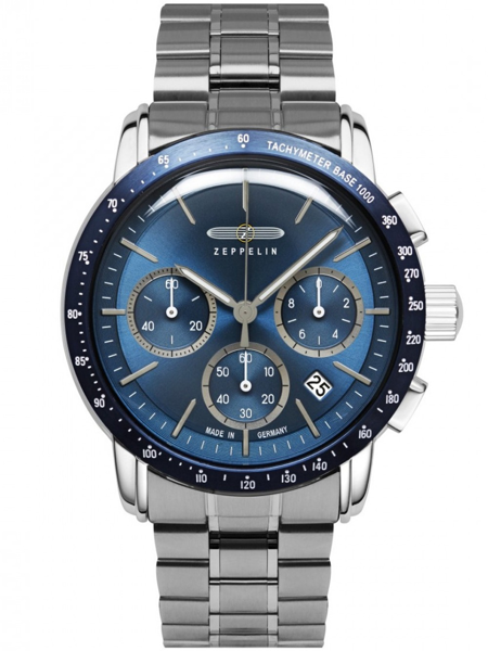 Blå urskive med metalrem, tre sub-dials, tachymeter, datovindue mellem kl. 4 og 5.
